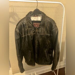 Andrew Marc leather jacket with a worn look. Lining is intact with no rips